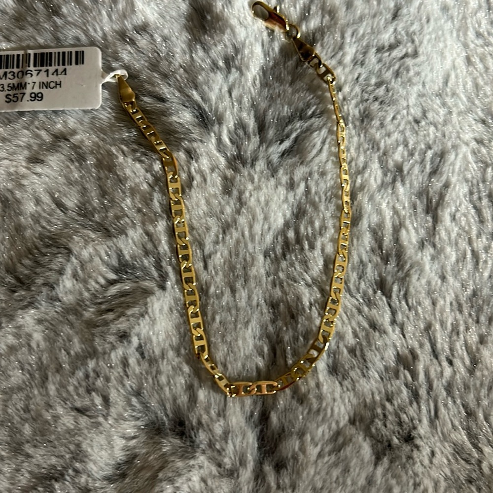 Gold bracelet 7”